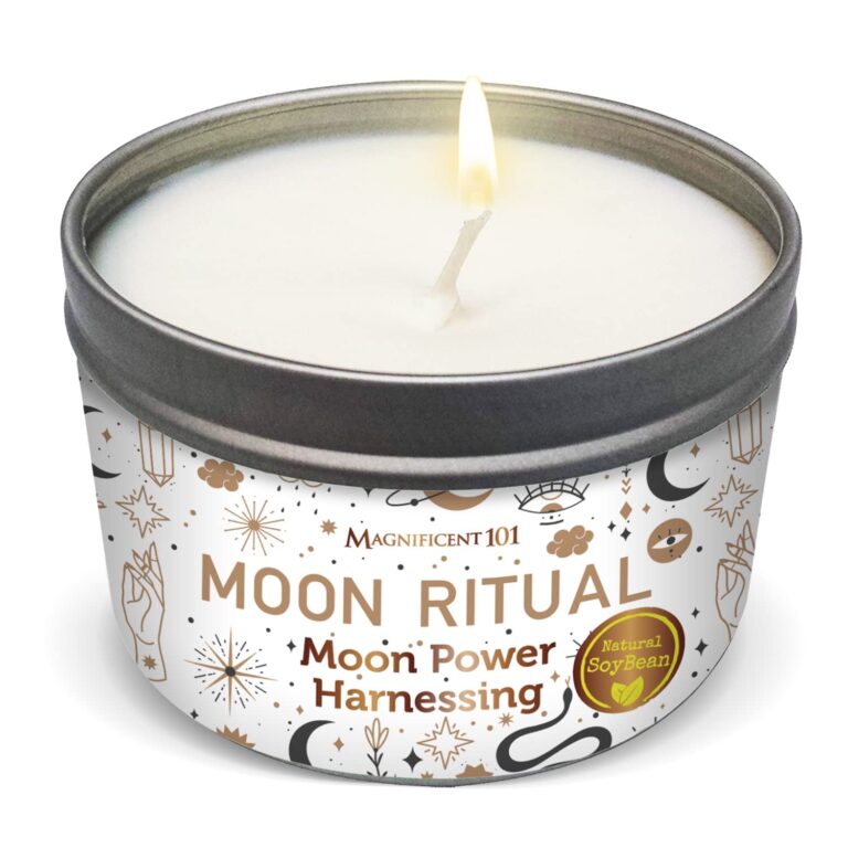 Lit "Moon Ritual" soy candle in a decorative tin